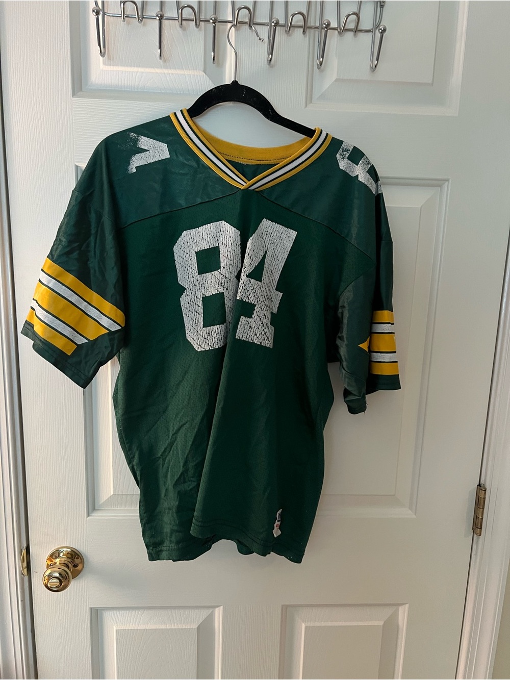 Wilson Green Football Jersey with Yellow and White Stripes, #84